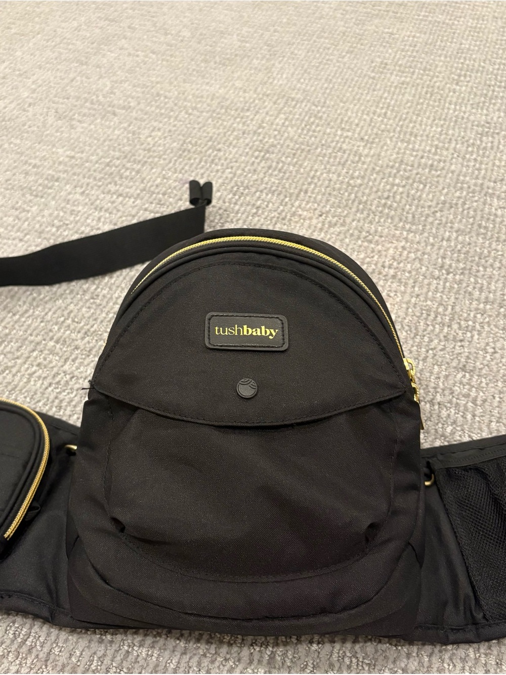 Like New TushBaby Black with Gold Accents Hands-Free Baby Carrying Bag